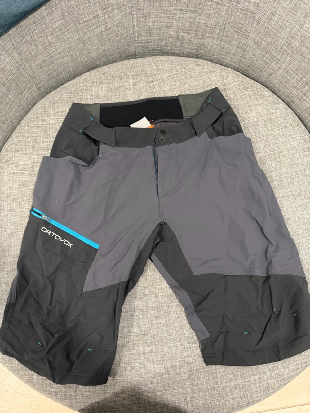 Ortovox Men's Gray and Black Mountain Bike Shorts with Blue Accents